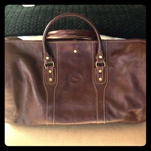 Italian leather convertible travel bag. Like new.